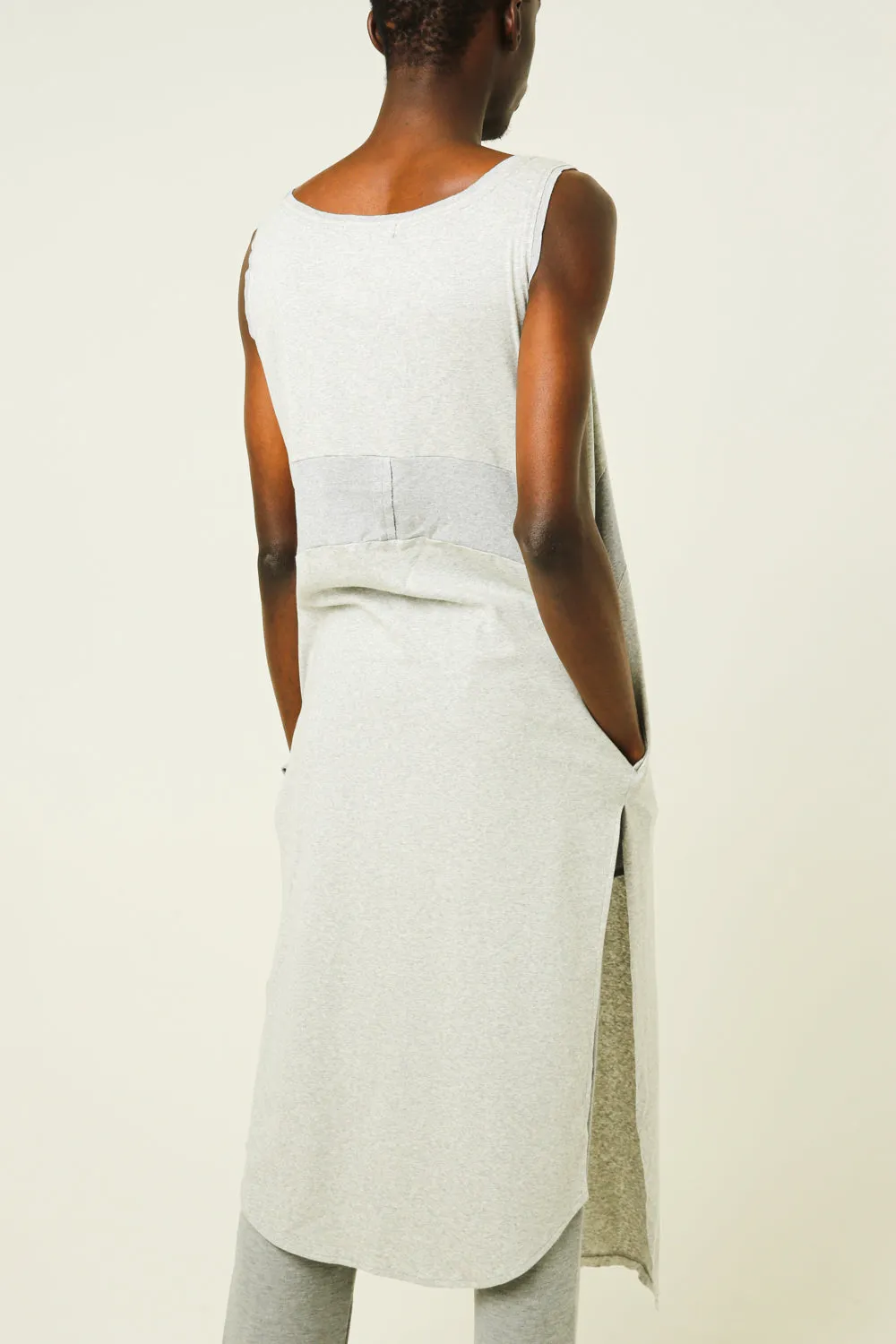 Sleeveless dress with a split